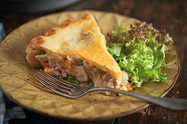 istock Fresh Baked Thanksgiving Leftover Pie with Turkey, Vegetables and Boiled Eggs 2251233720