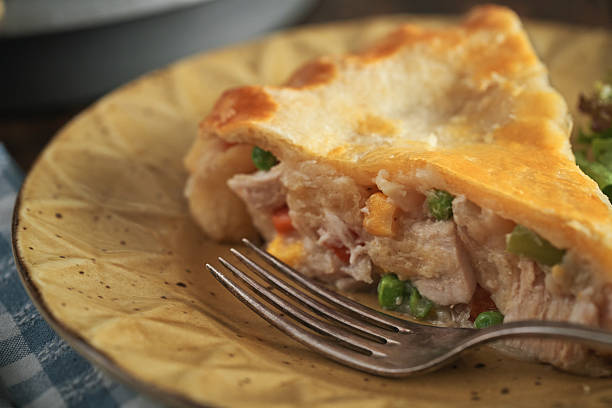 istock Fresh Baked Thanksgiving Leftover Pie with Turkey, Vegetables and Boiled Eggs 2251233721