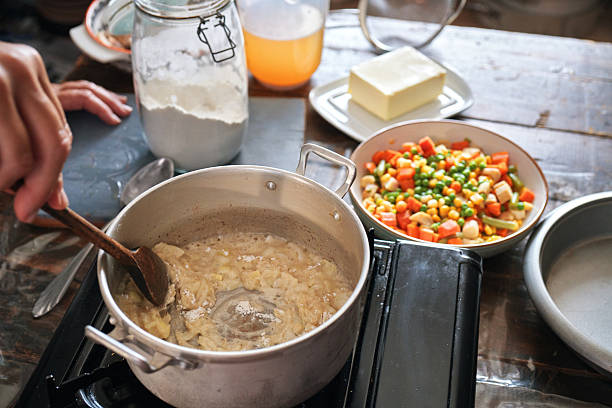 Preparing Thanksgiving Leftover Pie with Turkey, Vegetables and Boiled Eggs