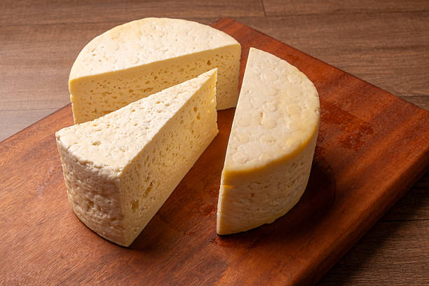 istock Semi-cured cheese, a wonderful semi-cured cheese from Minas Gerais on a rustic surface, selective focus. 2251235249