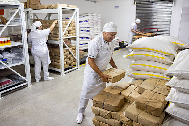 istock Baker organizing sacks of flour at an industrial bakery 2251241731