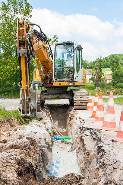 istock Laying a trench for domestic utilities 2251244803