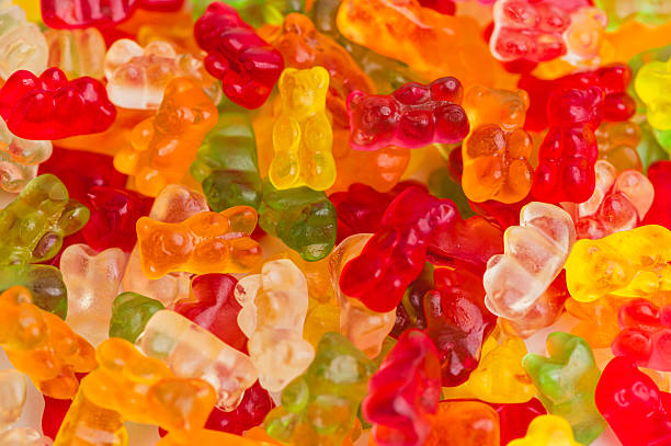 istock Colorful gummy bears on display in various shapes and sizes 2251248467