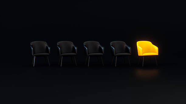istock One Yellow Chair Standing Out Among Four Black Chairs (3D Render) 2251248853