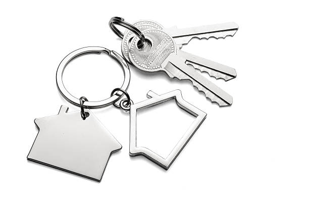 istock Silver keys with house keychain for home isolated on transparent white background 2251250035
