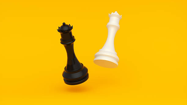 istock Black & White Chess Queens – Dynamic Duel on Bright Orange Background 2251250376