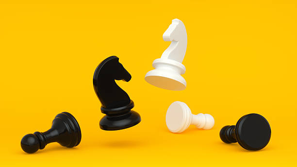 istock Black & White Chess Knights – Dynamic Duel on Bright Orange Background 2251250380