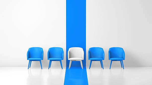 istock White Chair Among Blue Chairs in Minimalist Studio (3D) 2251250778