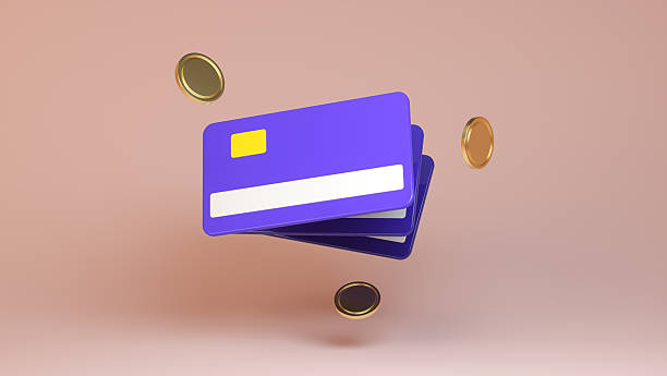 istock 3D Stack of Credit Cards with Floating Gold Coins on Soft Pink Background 2251251016