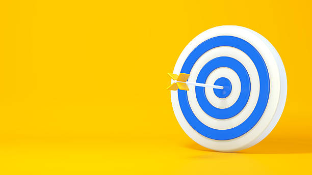 istock 3D Target Board with Arrow Hitting Center on Yellow Background 2251252108