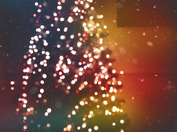 Colorful bokeh Christmas tree lights with soft snowfall overlay, creating dreamy festive atmosphere perfect for New Year 2026 designs, holiday backgrounds, and seasonal visual projects. Garland lights