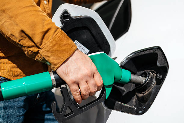 istock A man refueling a car at a gas station 2251256438