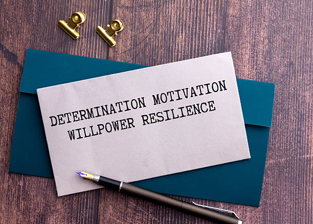 istock Inspirational and Motivational Concept - determination motivation willpower resilience text background. 2251256734