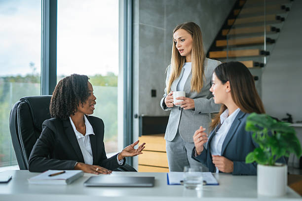istock Businesswomen discussing a challenging document with concerned expressions 2251256744