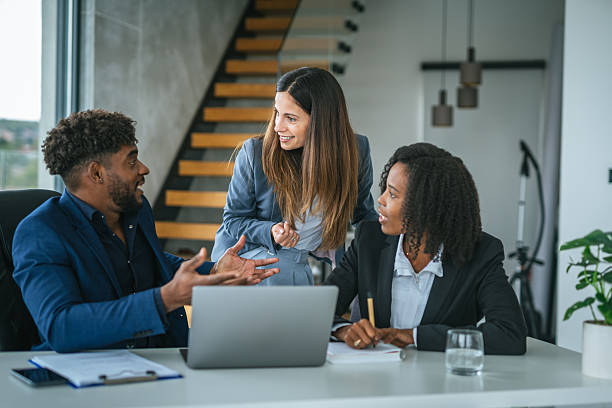 istock Diverse start up business team collaborating on laptop strategy 2251256854