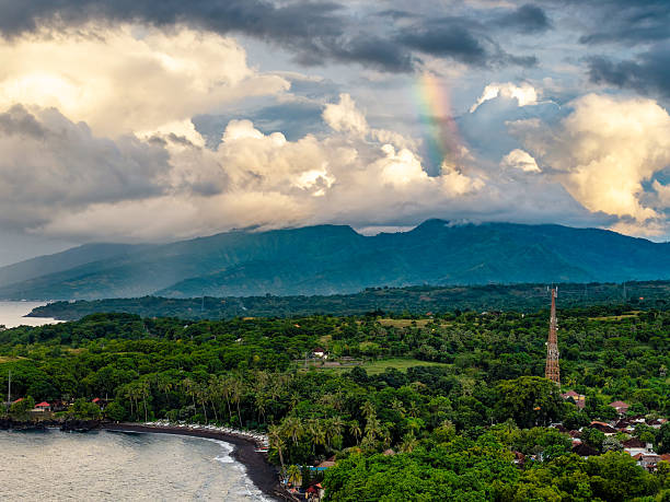 istock Dramatic Cloudy Sky Over Volcanic Bali Coastline 2251261719