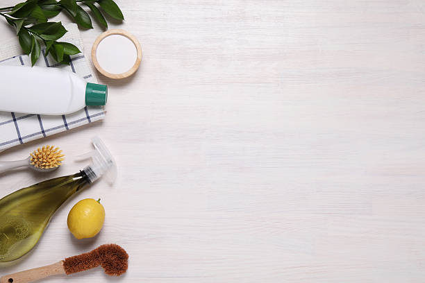 istock Flat lay composition with different cleaning supplies on light wooden background, space for text 2251266389