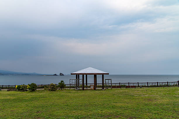 Benches with tent at the seashore
