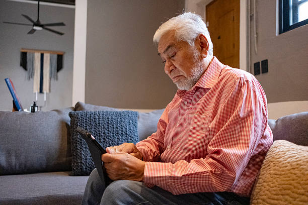 istock Elderly man using his tablet to carry out his activities, showing how technology can make life easier for senior citizens. 2251269364