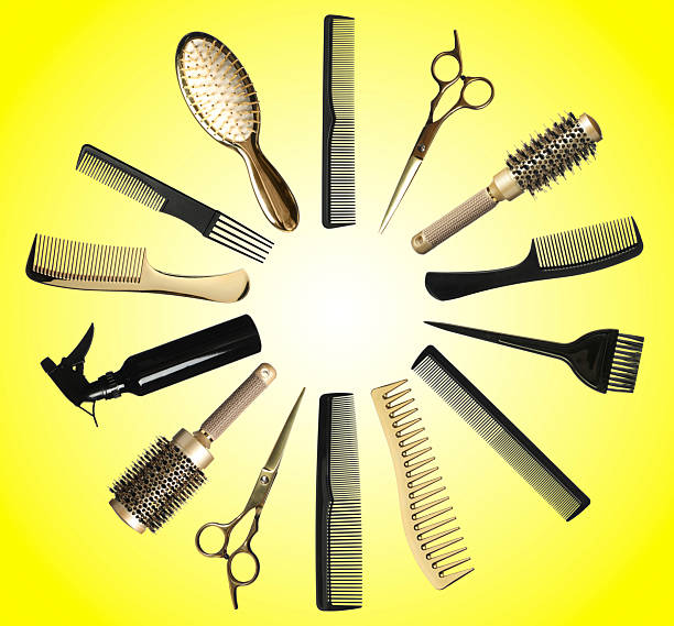 Different hairdresser tools on yellow background, set