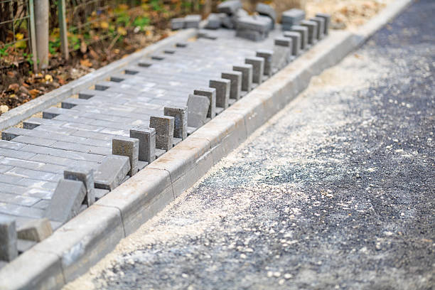 istock Pavement construction with concrete pavers on sidewalk project site 2251273767