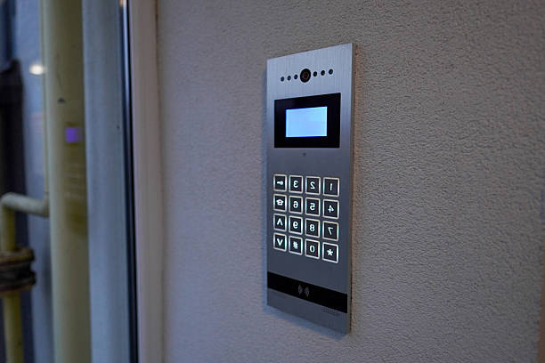istock Door entry system with keypad for apartment building at evening time in urban setting 2251274036