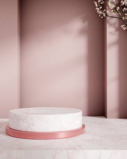 istock Empty white round marble product display platform with sakura cherry blossom in pink wall background 2251278776