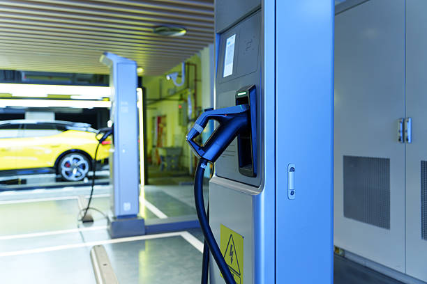 istock Electric vehicle charging stations in the underground parking garage. 2251280140
