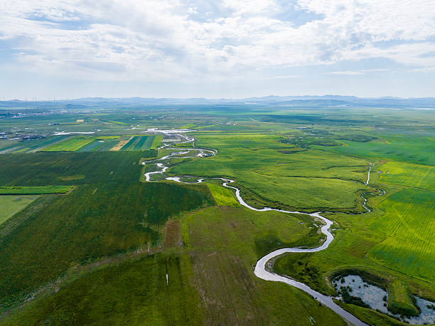 istock The river on the grassland 2251280250