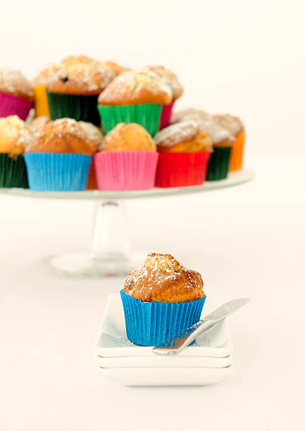 istock Muffins, Mixed Colorful Muffins on a White Background 2251280956