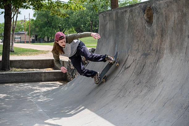 istock Skateboarder in Action at Urban Skatepark 2251282242