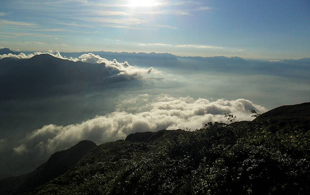 istock Panoramic view from the top of a mountain with low clouds. 2251287831