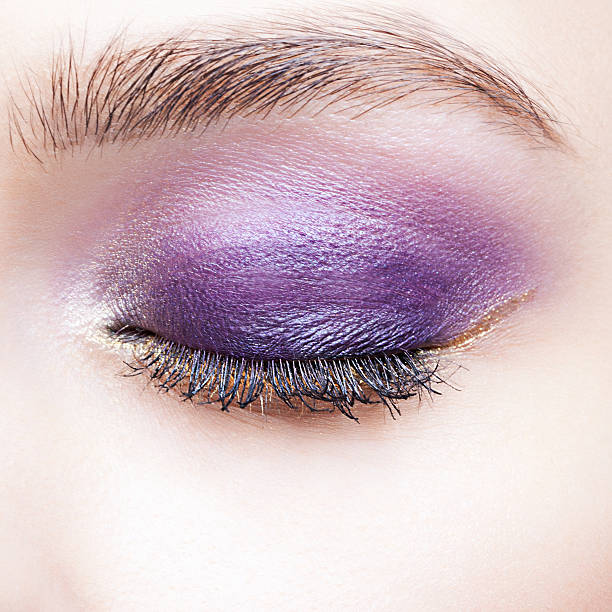 Texture of broken eyeshadow or powder. The concept of fashion and beauty industry. Close-up. - Image