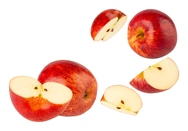 istock Falling Red Apple isolated on white background with clipping path, full depth of field 2251298682