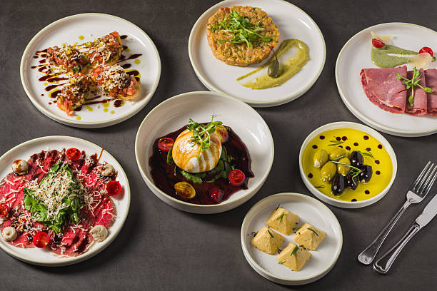 istock Colorful Mediterranean starters with olives, cheese, and vibrant sauces 2251299868