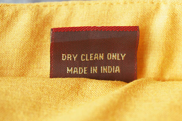 istock Care label showing dry clean instructions on fabric 2251299963