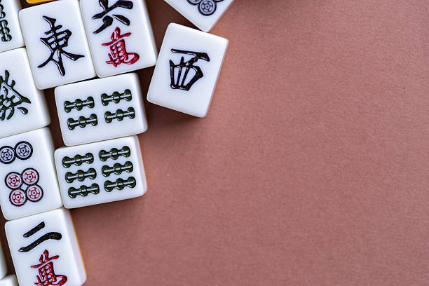 istock Mahjong tiles lined up on a light background 2251302905