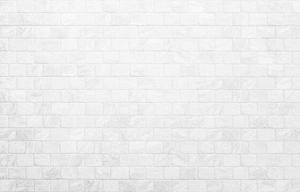 istock Wallpaper concept: Close up modern white brick tiles wall texture background. 2251304606