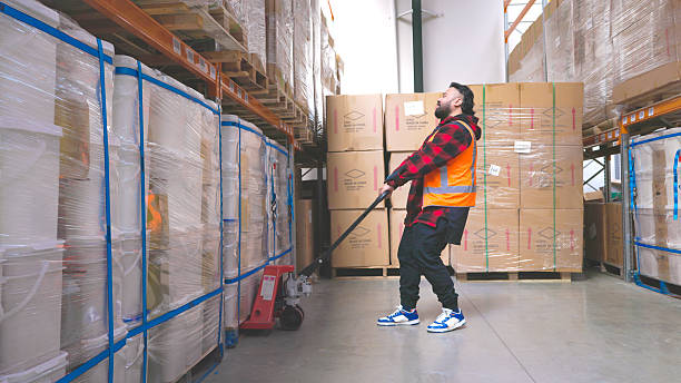 istock Maori man using a pallet jack in a warehouse 2251307403