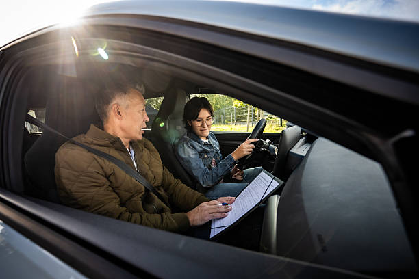 istock Point of View Student Focusing on Steering in Modern Car Interior 2251314375