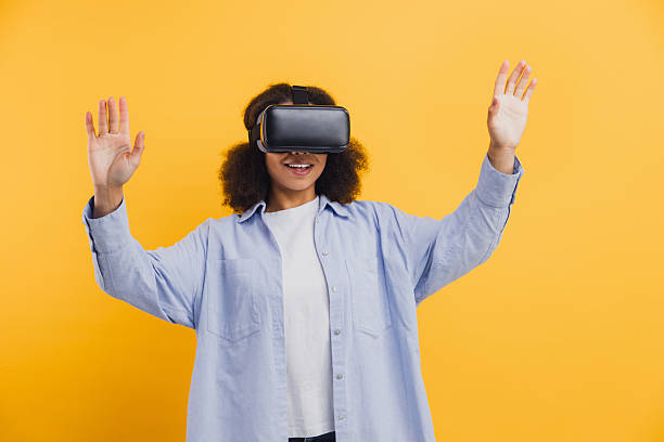 istock African American woman experiencing virtual reality game 2251314439