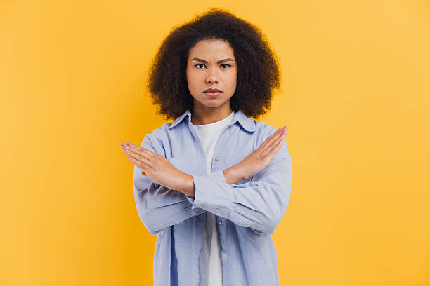 istock African American woman making rejection stop gesture 2251314473