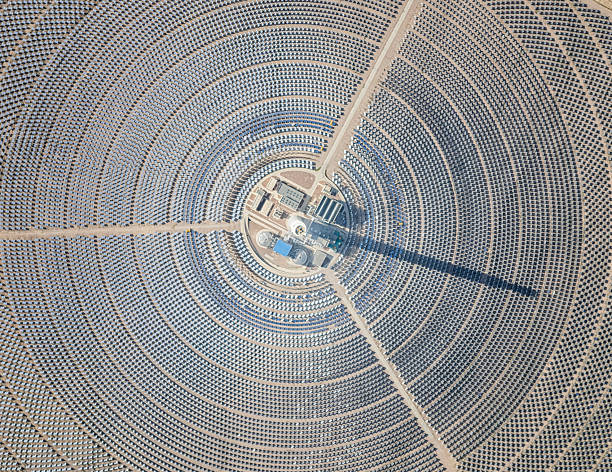 istock Concentrated Solar Power Tower and Mirror Field from Above 2251315543