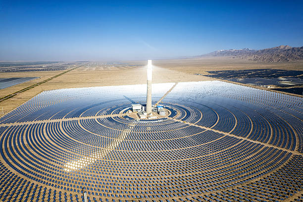 istock Concentrated Solar Power Tower and Mirror Field from Above 2251316433