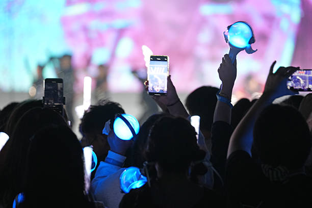 istock The audience enthusiastically waved their support lights 2251320361
