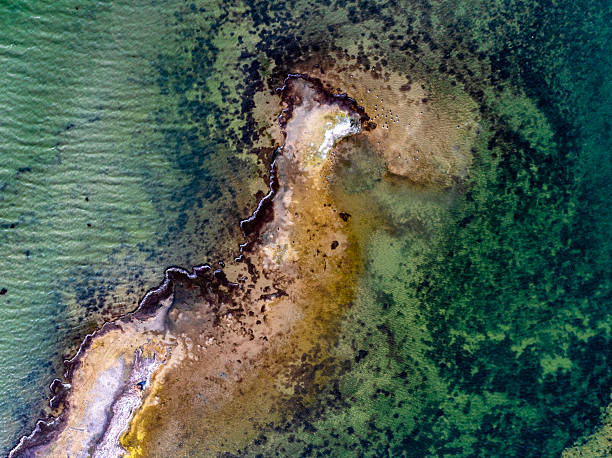 istock Dangers and droughts affecting lakes,Abstract photography, backgrounds for billboards, global climate-themed photographs. The magical beauty of colors. The colors and patterns of lakes and rivers. 2251321423