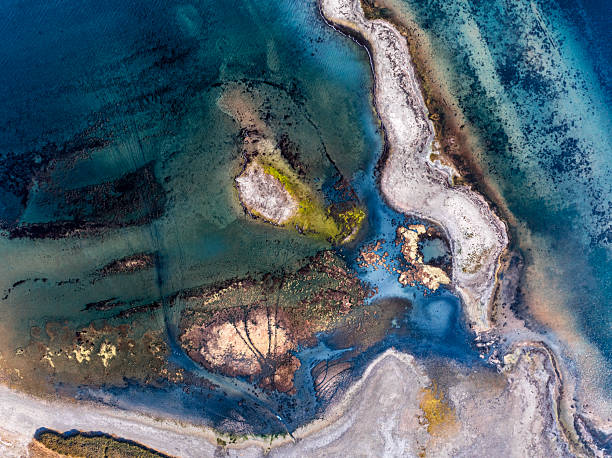 istock Dangers and droughts affecting lakes,Abstract photography, backgrounds for billboards, global climate-themed photographs. The magical beauty of colors. The colors and patterns of lakes and rivers. 2251321484
