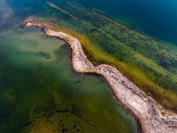 istock Dangers and droughts affecting lakes,Abstract photography, backgrounds for billboards, global climate-themed photographs. The magical beauty of colors. The colors and patterns of lakes and rivers. 2251321489