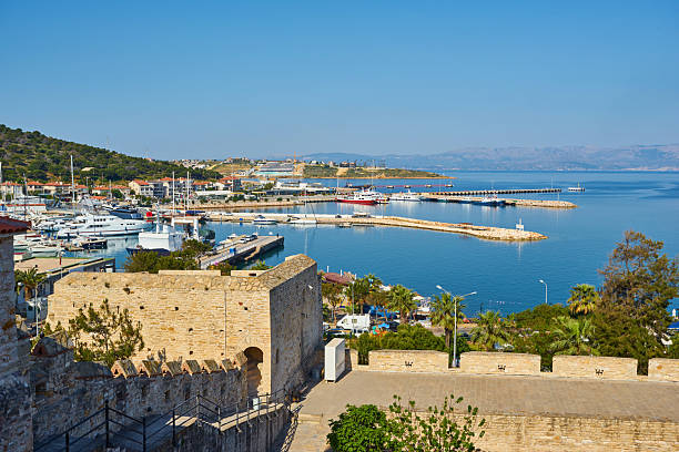 istock Marina yachts and buildings on background in Cesme 2251321720