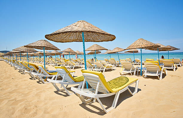 istock Empty sunbeds on ilica beach by the open sea, Cesme 2251321727